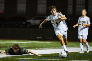 Stryker (900 x 600 px) The author driving the ball during a soccer game.