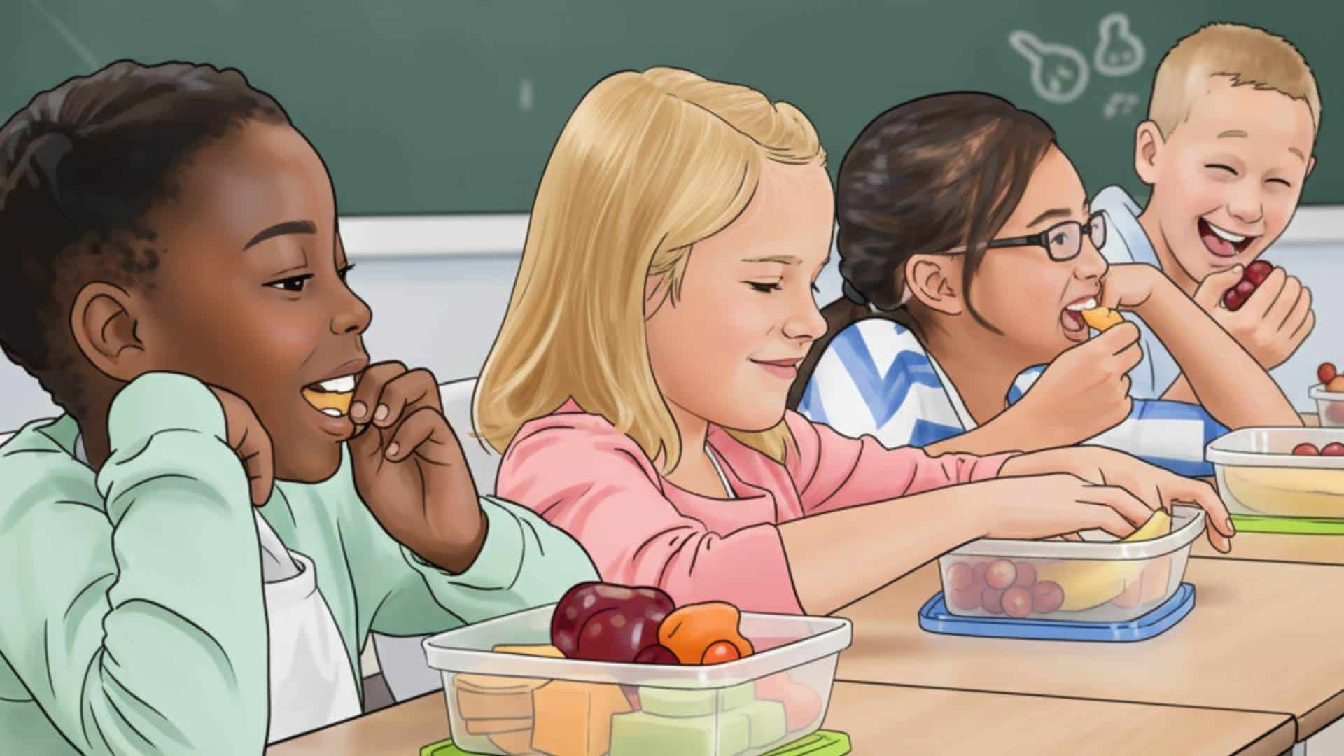 Children eat snacks in a classroom.