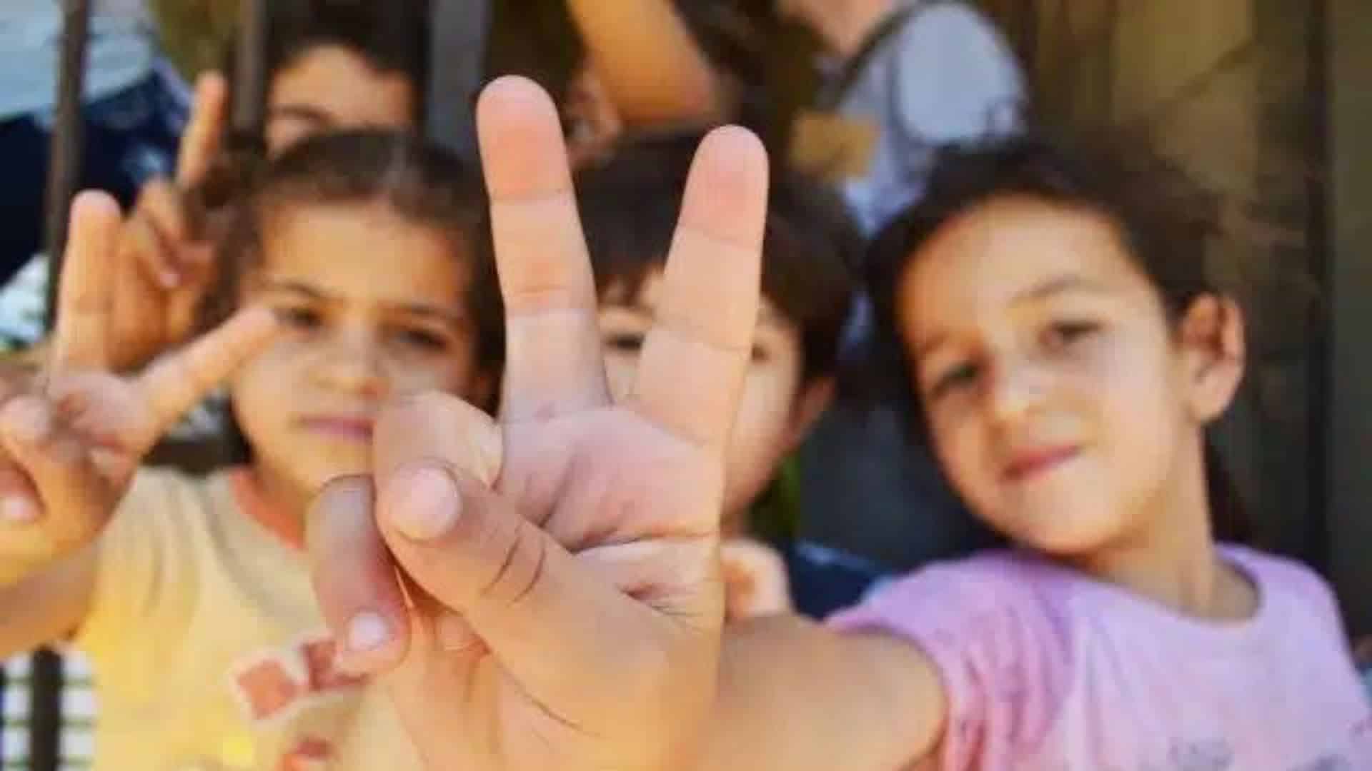 Decoder Replay War is more complicated Syrian refugee children in Lebanon make the peace sign.