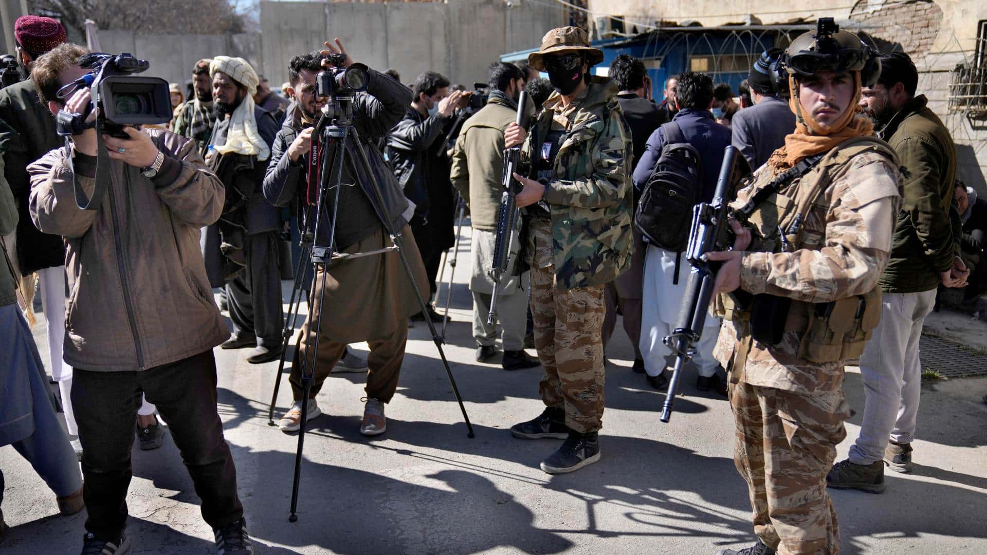 Replay Afghanistan Afghan cameramen cover a protest against U.S. President Joe Biden in Kabul, Afghanistan.