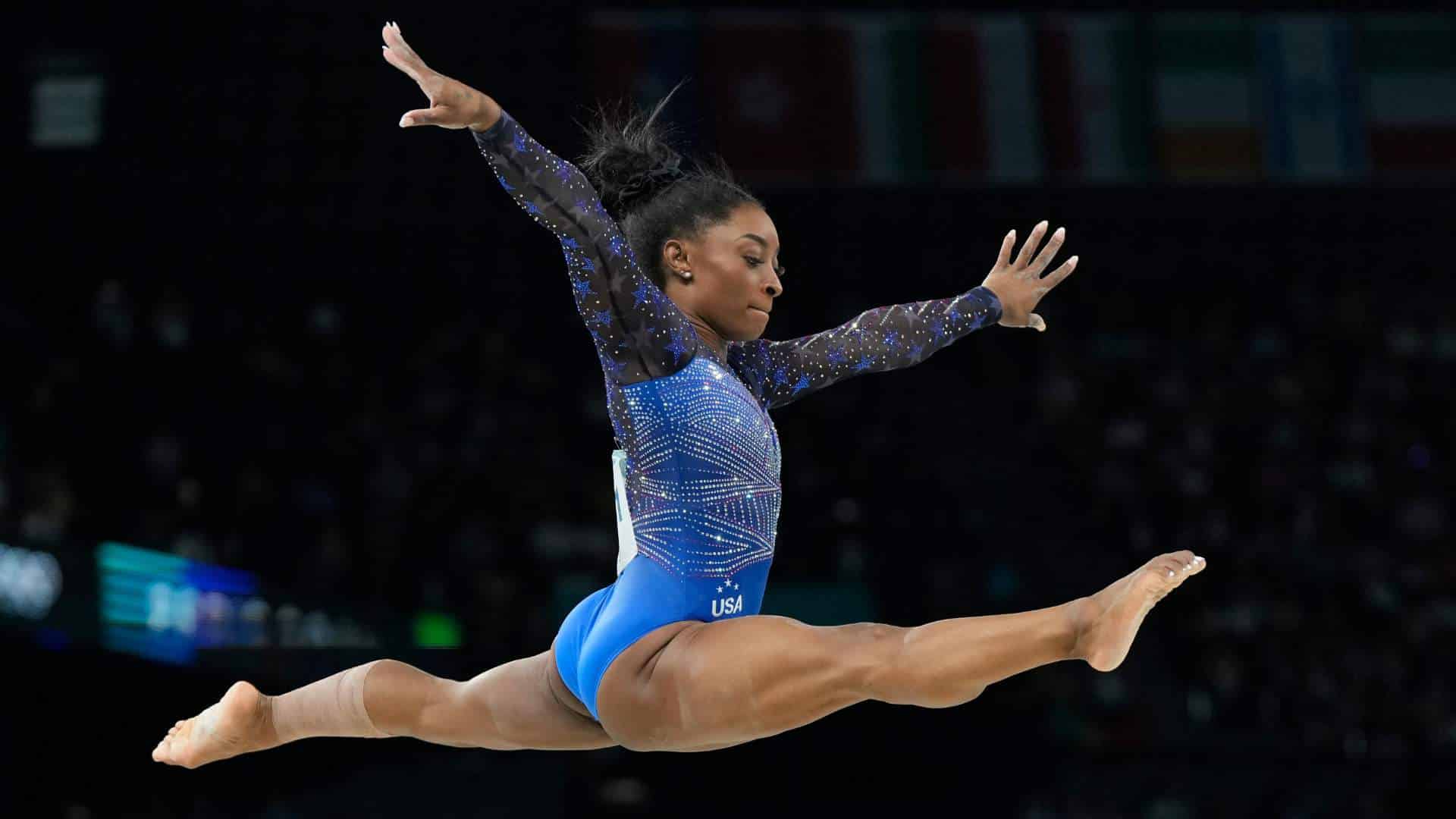 Athlete mental health (1) Simone Biles in midair