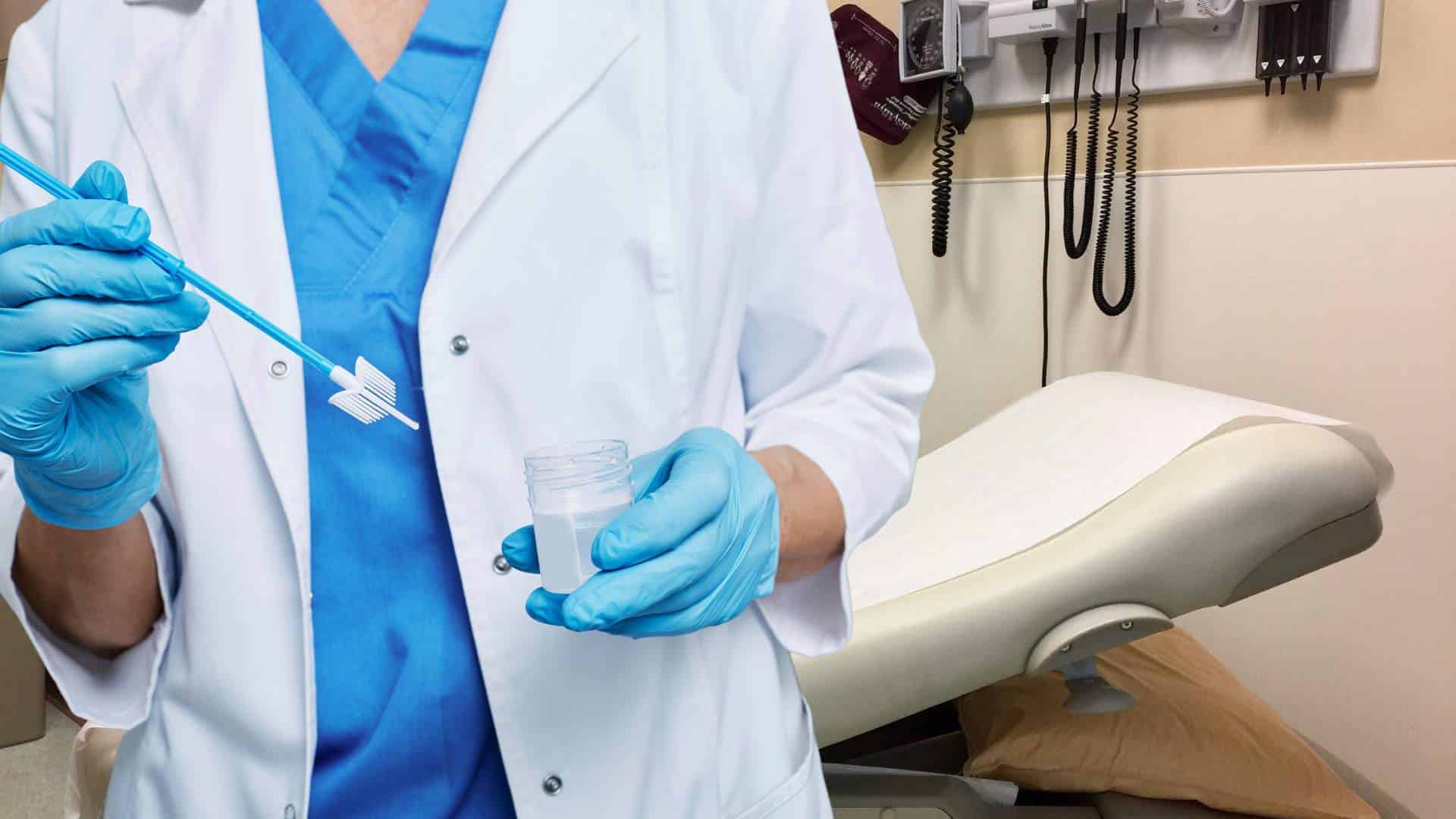 World War on Cancer A scientist introduces liquid into a test tube.